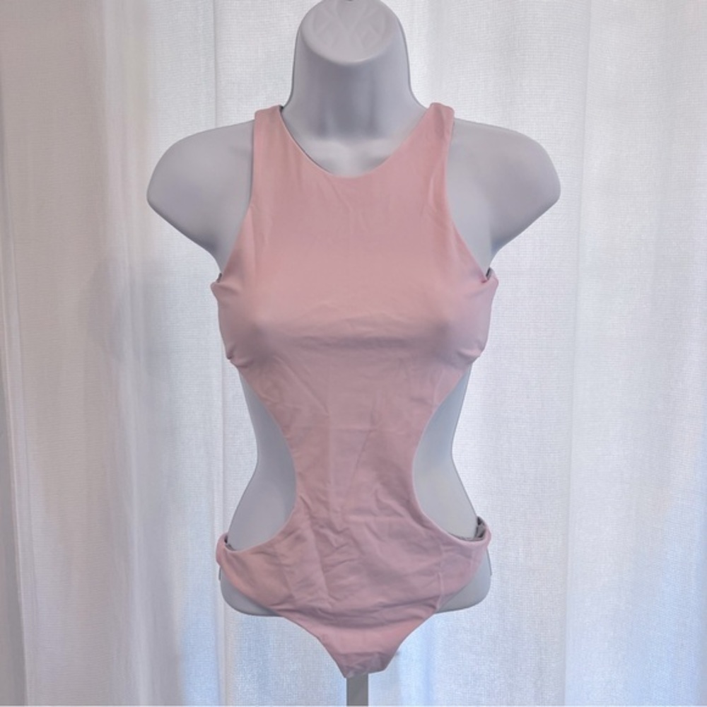 NWT Nirvanic Oqui One Piece Small